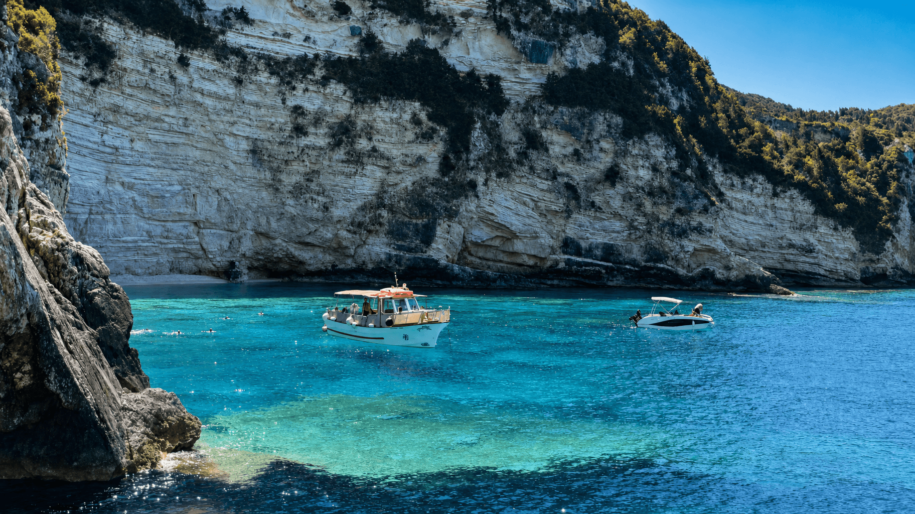 paxos-traditional-boat-cove-swimmers