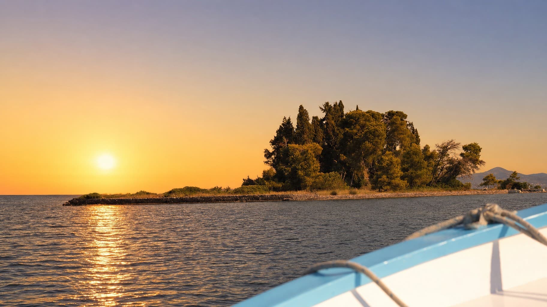 sunset-islet-from-boat-bow-golden-hour